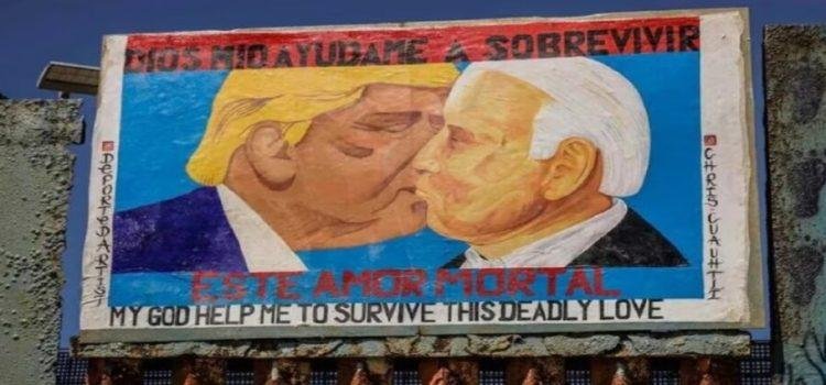 Activistas pintan mural de Trump y Joe Biden en el muro fronterizo Activistas pintan mural de Trump y Joe Biden en el muro fronterizo