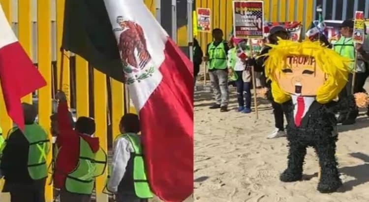 Defensores de migrantes protestan en muro fronterizo de Tijuana