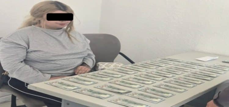 Detienen a ciudadana americana con más de 900 mil pesos